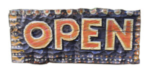 An Open sign from a rustic cafe