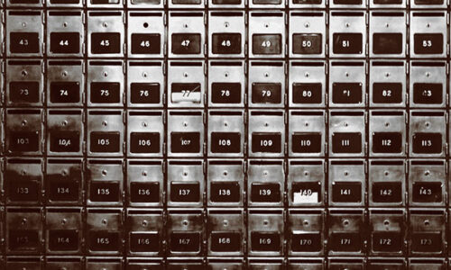 wall of old fashioned mailboxes