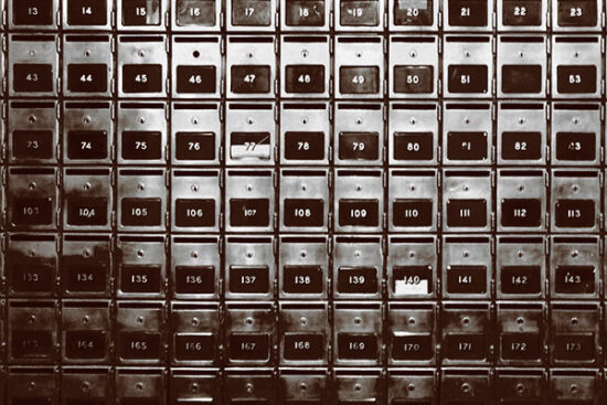 wall of old fashioned mailboxes