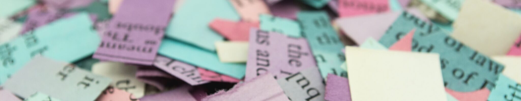 A colorful pile of paper tickets