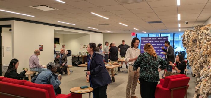 people in a room for open house