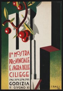 Vine of cherries hanging from an iron wall with colored words on the bottom of the wall