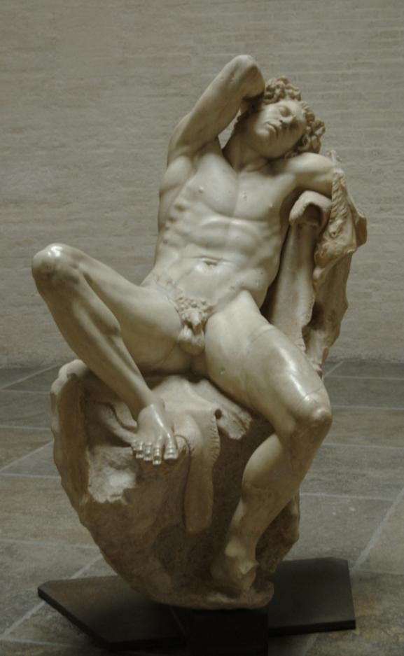A frontal image of the Barberini Faun from Ancient Greece which is a sculpture of a nude figure