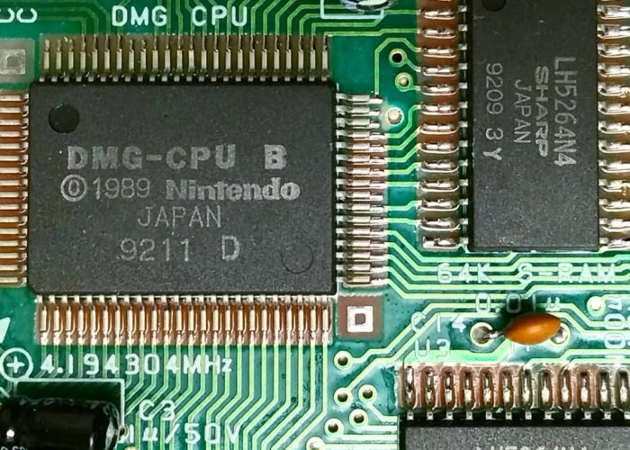 a closeup of a circuit board with several visible chips