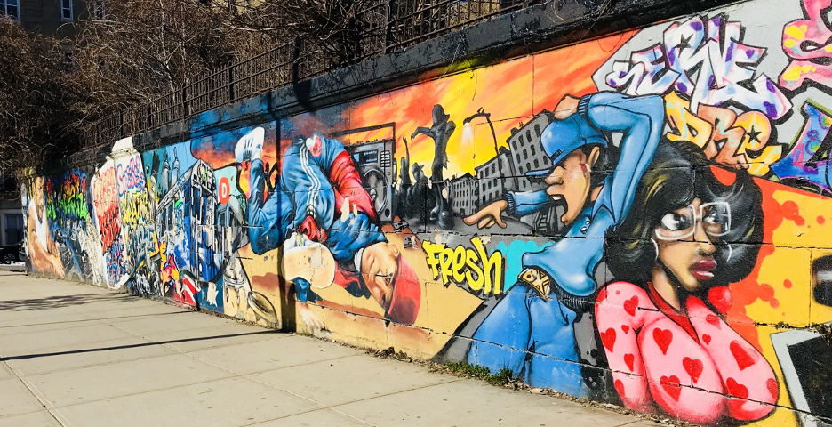 Mural in the Bronx depicting street art and gentrification in the Bronx.