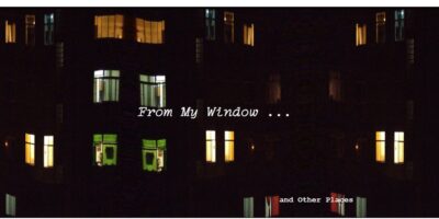 “A dark building façade with apartment windows lit up in different colors. White text over the image reads ‘From My Window … and Other Places.’”