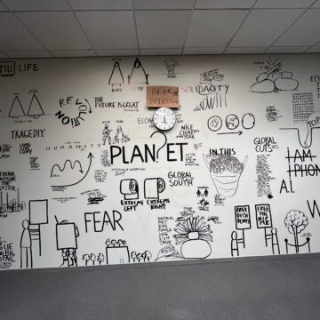 Image of drawings by Perjovschi in the wall of Room 5409