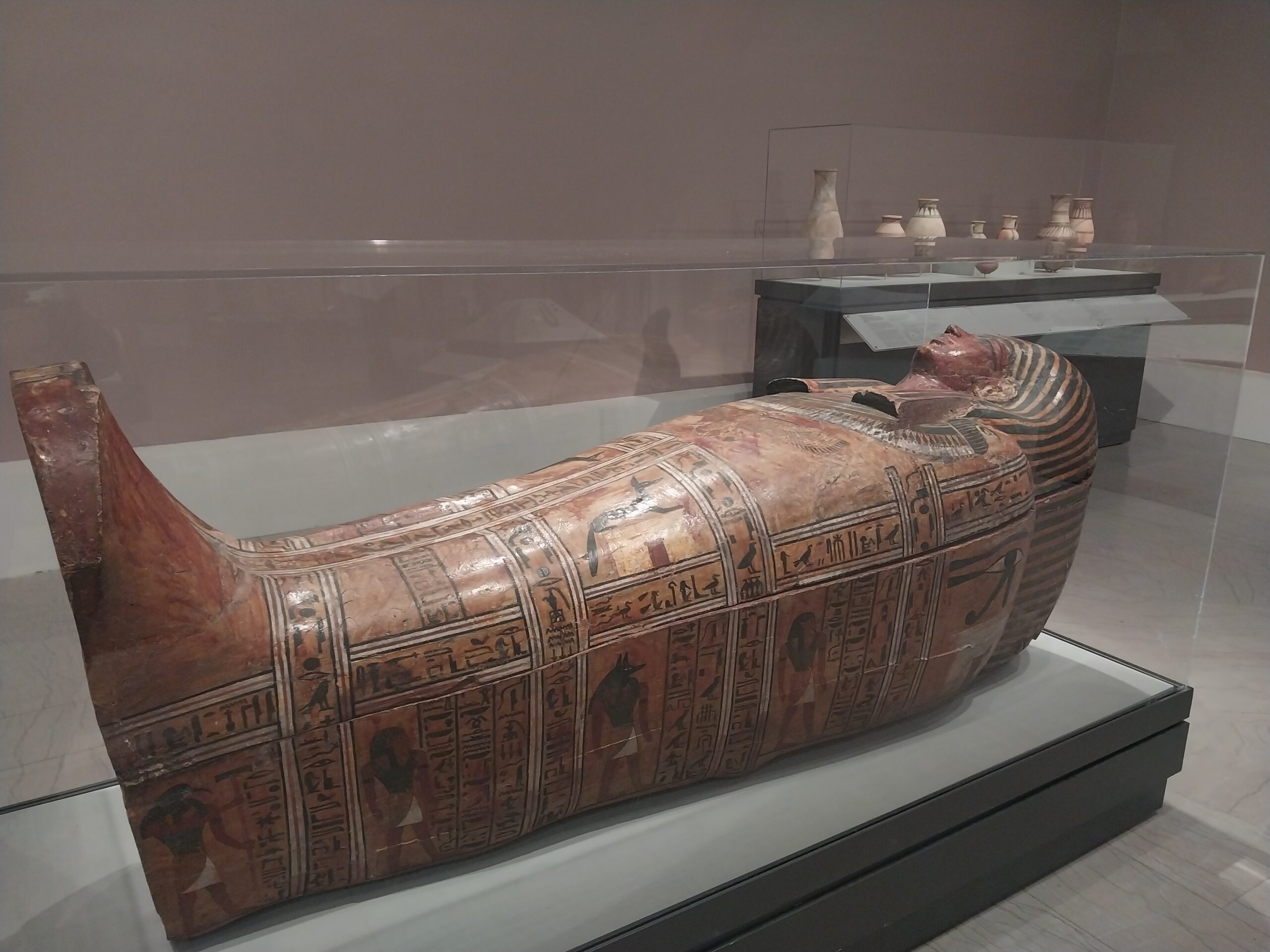 Here we see a tomb, decorated with symbols and pictures of Egyptian gods and words.