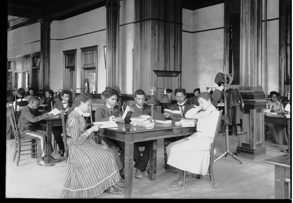African American students reading in library