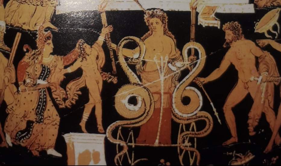 Depiction on pottery of a woman, surrounded by two snakes, to her left is a naked man, to her right a small naked male child on a plinth and a woman with a knife holding him by the head