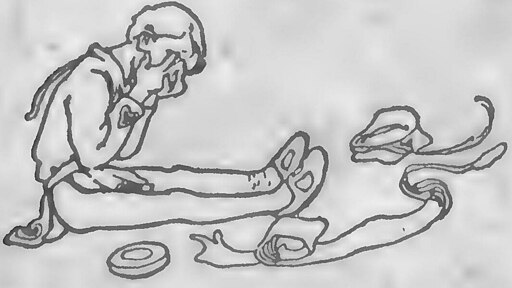 Peter sits with legs outstretched crying near his hat on the ground and a rolled up shadow