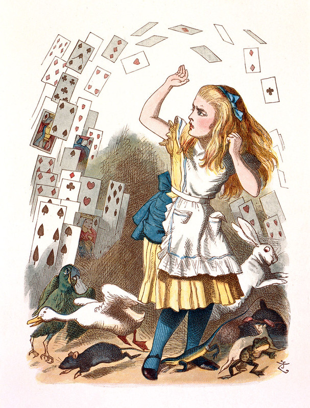 colored image of blond alice with arms riased wearing a yellow dress and blue tights being attacked by a pack of playing cards flying up, below assorted animals including the white rabbit