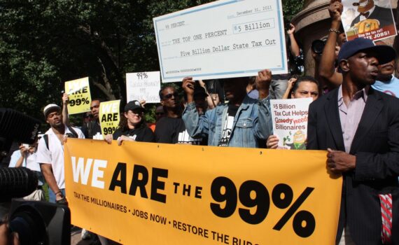 Occupy Wall Street supporters take part in the Park Avenue millionaires protest in New York on October 11.