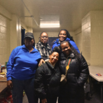 Chebella Hayward (left) stands with members of the Grant Food Pantry team.