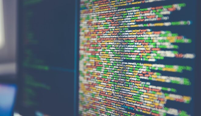 Code lurks on a screen in multiple colors.