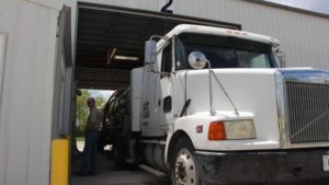 Grower-Customer filling up on liquid fertilizer 