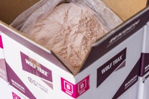 With EvenCoat Technology, WOLF TRAX DDP micronutrients thoroughly coat every granule in a fertilizer blend. This uniform coating ensures micronutrients are evenly distributed throughout the blend. Photo: Koch Agronomic Services