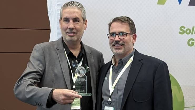 DPH Bio Mick Messman and Brad Holzworth accept BAW award 2
