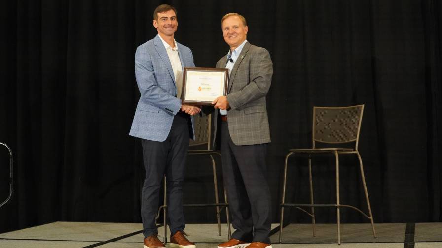 Timac Agro USA Director of Agronomy Michael Pisciotta (left) accepts the Certified Biostimulant recognition for DUO MAXX from Corey Rosenbusch (right), CEO of The Fertilizer Institute at the Agronomy Conference and Expo in St. Louis, MO on August 13, 2024. (Photo: The Fertilizer Institute)