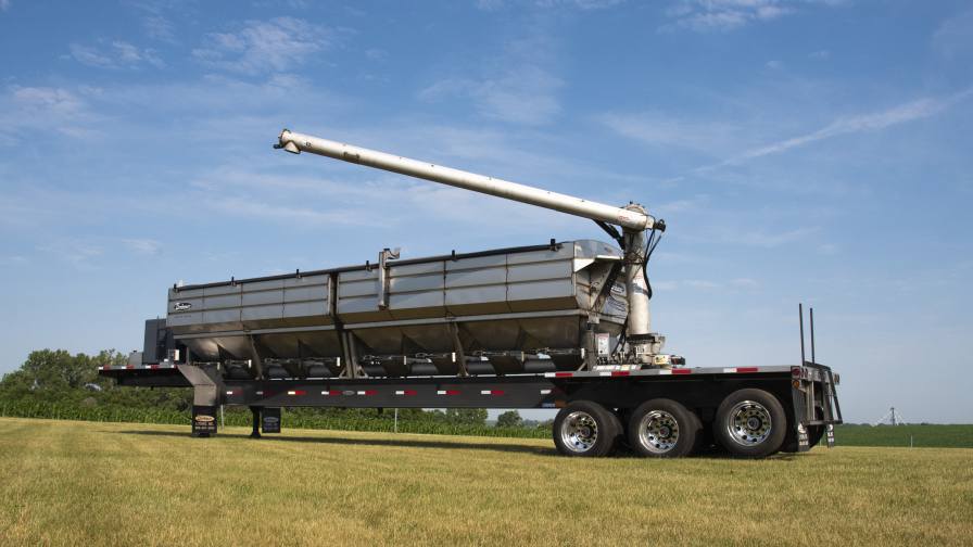 Brehmer Mfg. Overhead Discharge Tenders offer increased functionality with 270-degree rotation and top-mounted orbital motor on the vertical auger to reduce corrosion. Photo: Brehmer