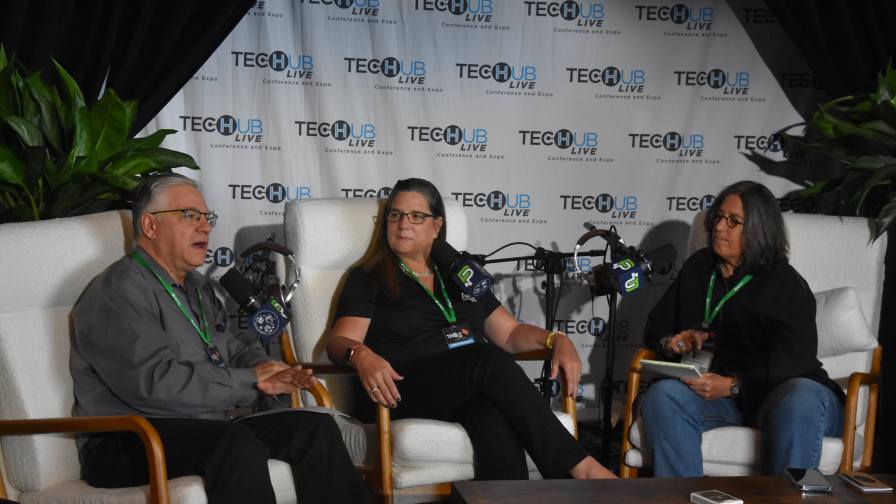 Amy Asmus (middle) of Asmus Farm Supply discusses AI in agriculture with CropLife Editors Eric Sfiligoj and Lara Sowinski during an episode of Retail Week at Tech Hub LIVE.