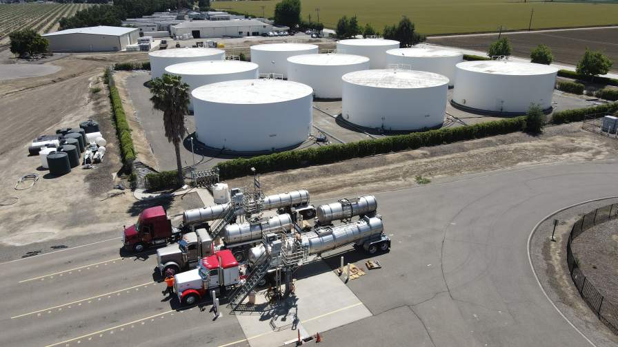 An aerial view of tanker trucks being loaded at a retail facility. Photo courtesy of Kahler Automation