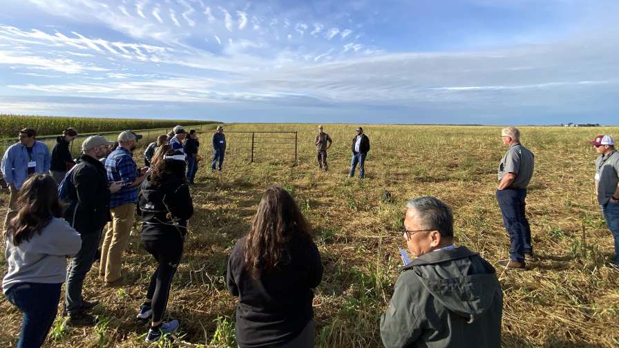 Tour participants visited a grain and livestock farm operated by David and Benji Hiebert, near Iroquois, South Dakota, to learn how rotational grazing and cover crops can benefit soil health, water quality and livestock production. Photo: WSSA