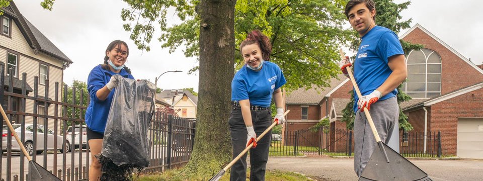 Three volunteers gardening