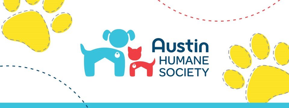 A banner with the Austin Humane Society logo surrounded by yellow paw prints