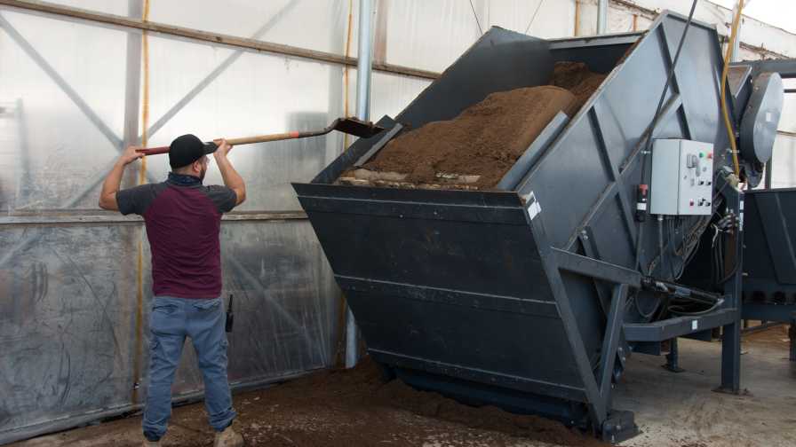 Loading up a soil mixer at Green Lake Nursery