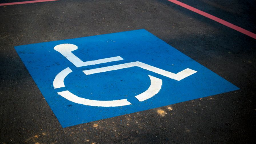 handicapped parking painted sign graphic for ADA compliance greenhouse design