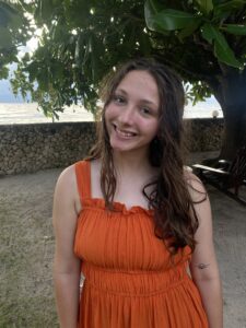 Aubrey McKenna, Vic & Margaret Ball Internship Award winner working at Emerald Coast Growers