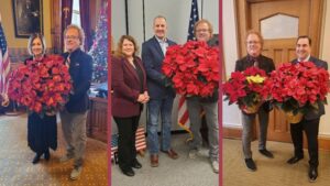 Iowa Leaders Receive Special Deliveries on National Poinsettia Day