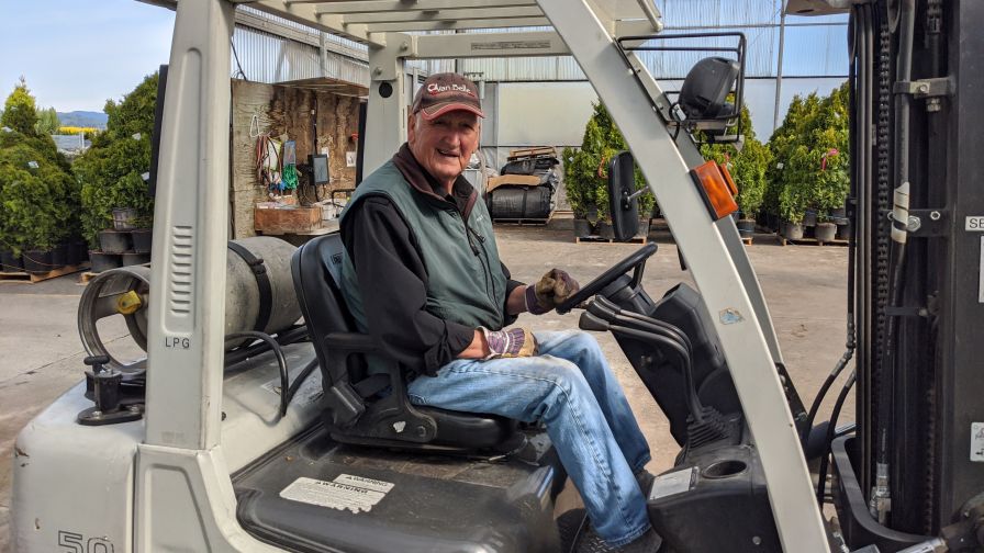 Bill Van Belle of the Van Belle Nursery on a forklift.