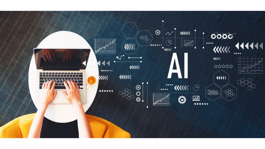 AI with a person using a laptop on a white table.