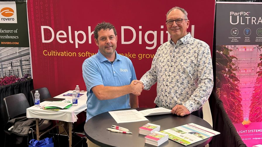 A handshake between Biophi and Delphy representatives.