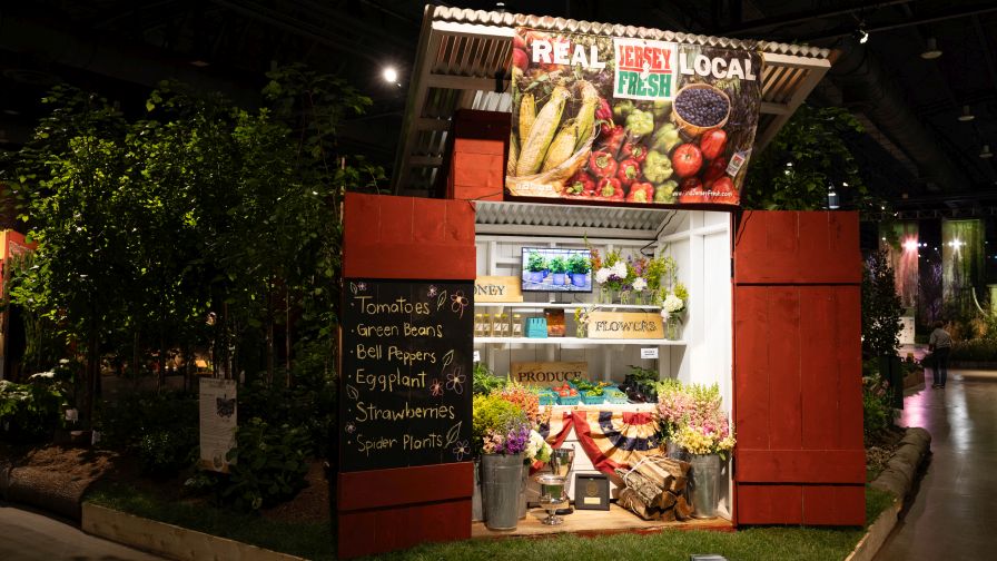 The "Peter Henderson to Present: The Horticulturists of the Garden State" exhibit from Mercer County Community College, the winner of the PHS Philadelphia Flower Show Cup for Best in Show — Educational Exhibits.