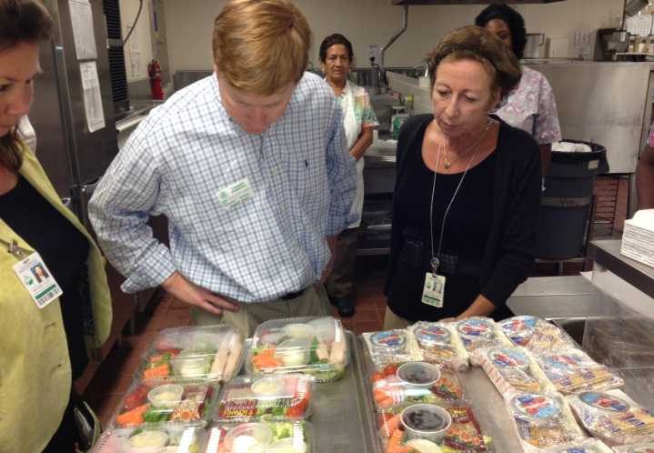 Florida Ag Commissioner Adam Putnam checks out prepared school lunches. School meals are looking more colorful these days as fresh produce finds a place on the tray.