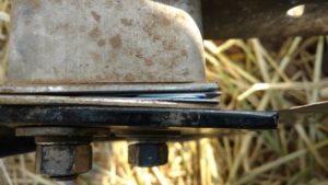 The side-to-side alignment of the shank was corrected with shims to prevent snags.