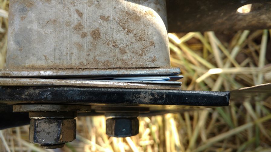 The side-to-side alignment of the shank was corrected with shims to prevent snags.
