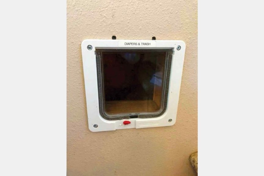 Install a cat door in the nursing/changing area so that garbage goes to a receptacle outside the building.