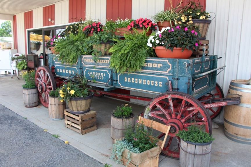 An old wagon doubles as a display.