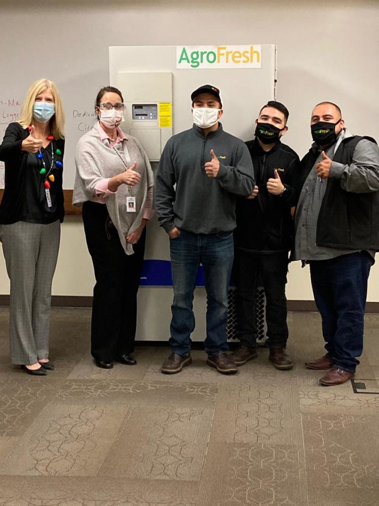 Those involved in the timely gift of the usage of ultra-cold freezers to store precious COVID-19 vaccinations include (from left) Teresa Rice and Lori Kelley of the Yakima Valley Farm Workers Clinic, and from AgroFresh Solutions, Emilio Gonzalez, Jonathan Perez, and Julio Cruz. (Photo: AgroFresh)