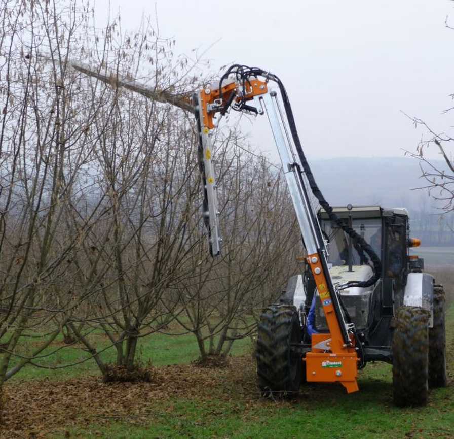 mechanized tree pruner in action
