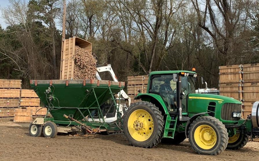Side view of Strickland Bros. Enterprises Seed Master at Howell Farming Co. s