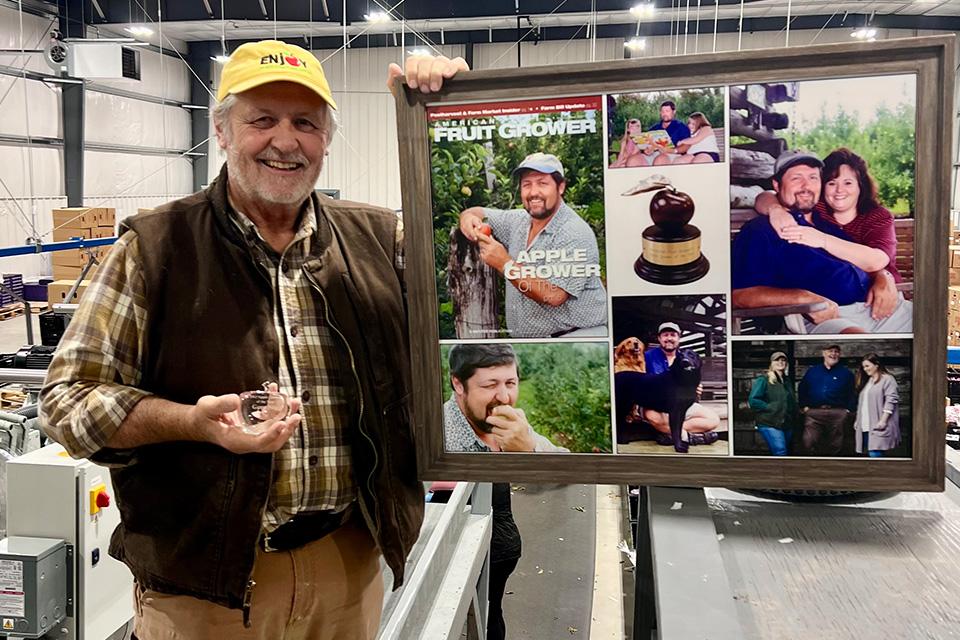 2001 Apple Grower of the Year Greg Nix with updated trophy recognition