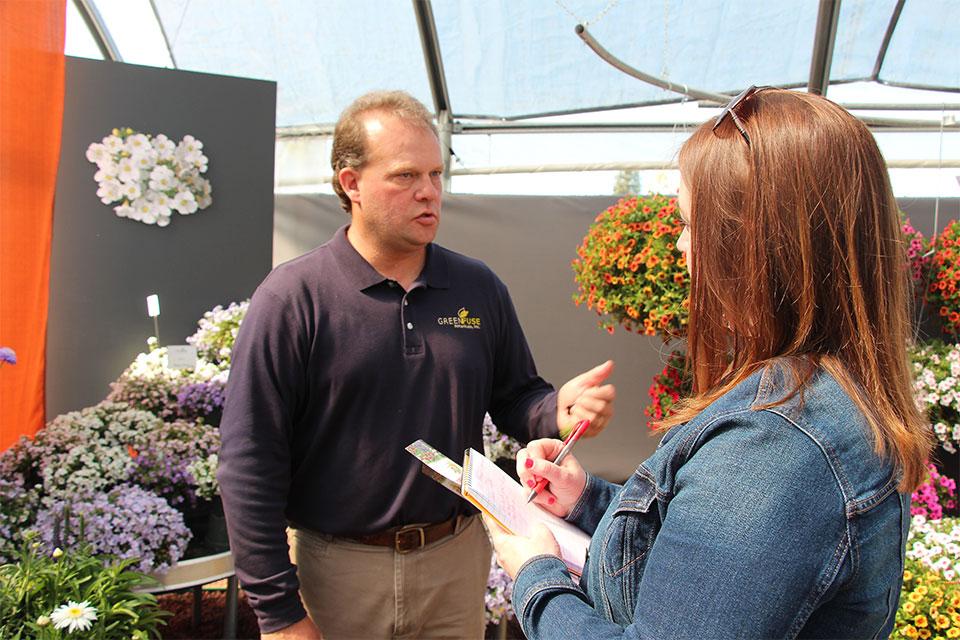 grower being interviewed by reporter