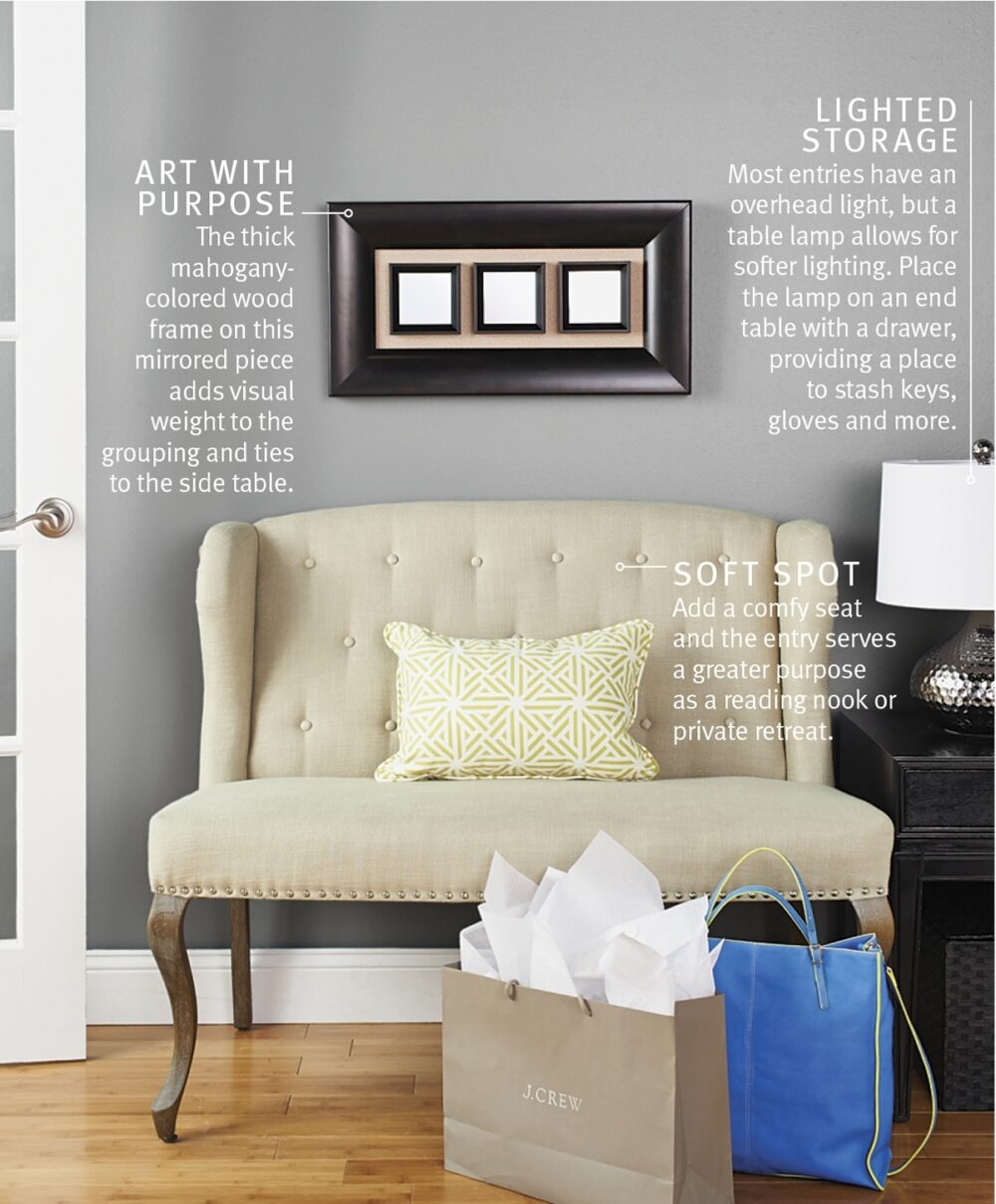 An entryway with a settee, end table and lamp