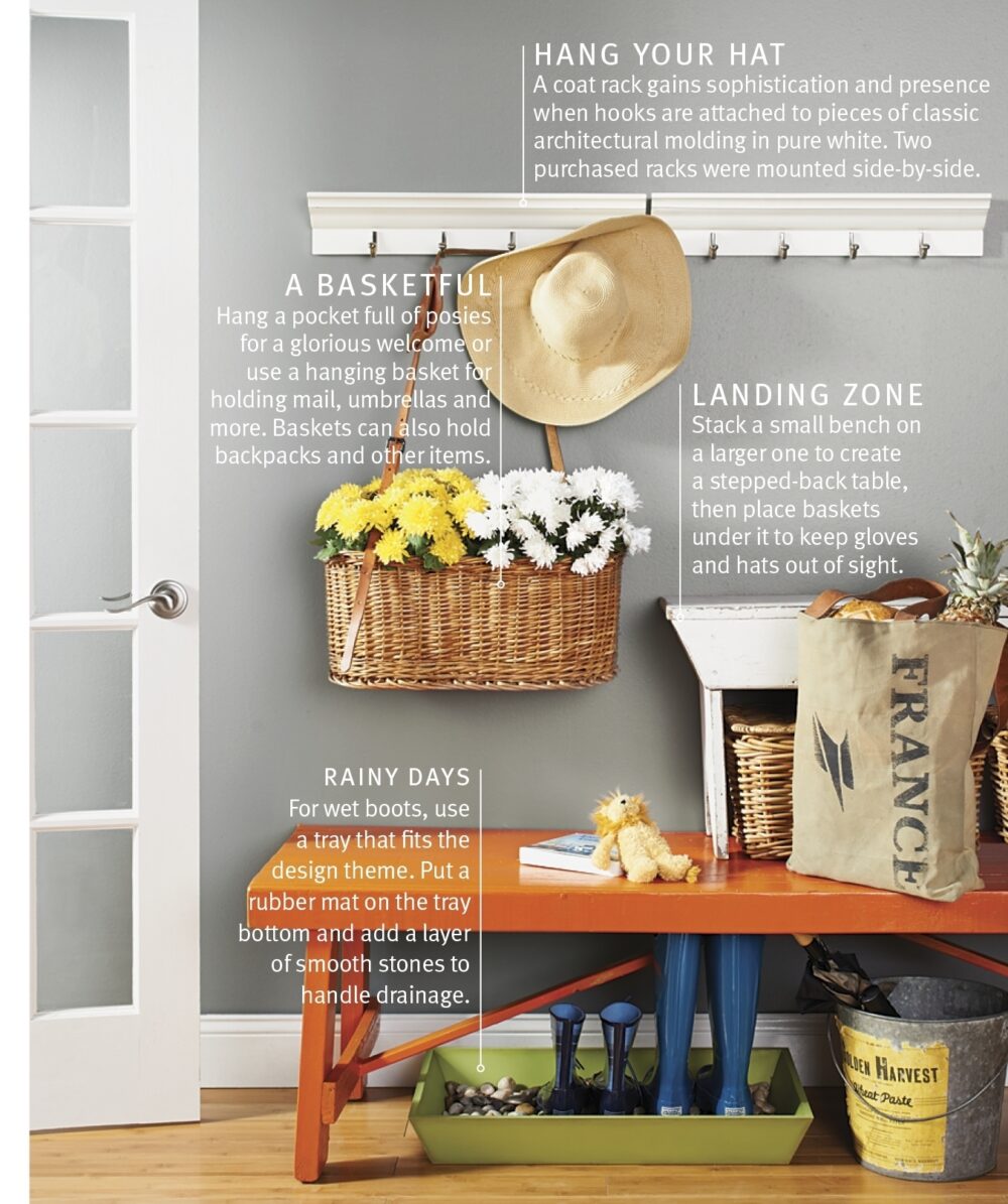 A bench provides a place to sit in an entryway, and a row of hooks offers a place to hang items.