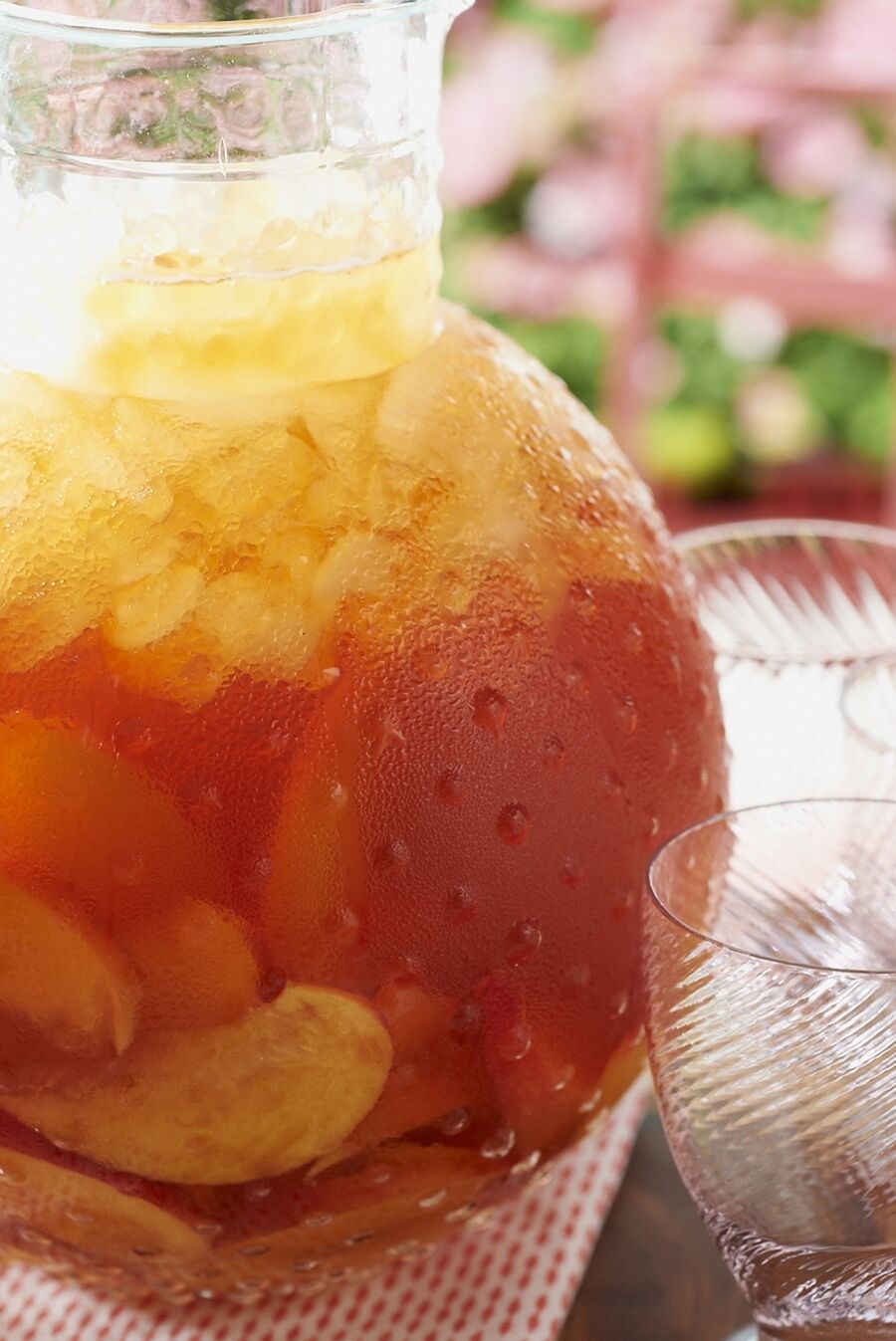 Peach Iced Tea recipe served in a pitcher.
